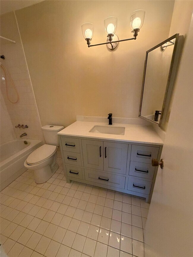 Building Photo - 7410 Woodmont Terrace