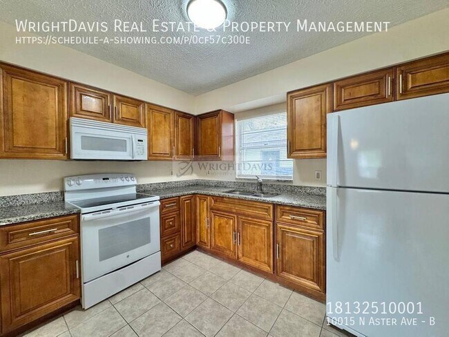 Building Photo - 10015 N Aster Ave