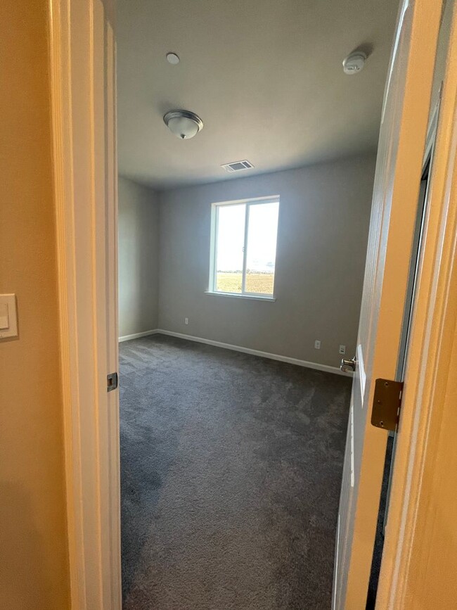 Building Photo - Four Bedroom, Two and a Half Bath Home