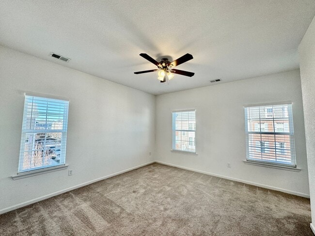 Building Photo - 3 Bedroom Townhome in Spence Crossing! Water/Sewer/Trash/Landscaping INCLUDED! - Attached Garage ...