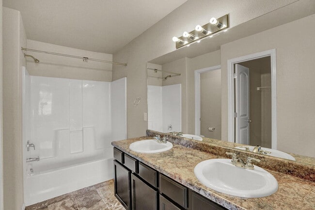 Building Photo - Modern Townhome with Central A/C, 2-Car Ga...