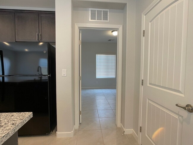 Building Photo - 4 BED 2 BATH 2 CAR GARAGE SINGLE STORY SINGLE FAMILY HOME w/ PAVED BACKYARD IN CADENCE COMMUNITY,...