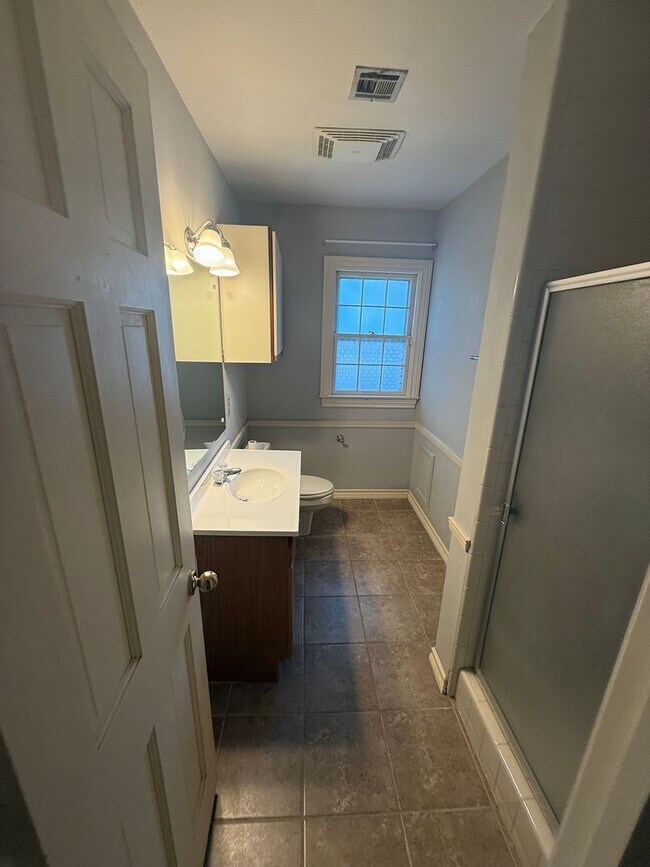 Building Photo - Better Photos Coming Soon! Charming Midtown Retreat with Office/Extra Bedroom, Hardwood Floors an...