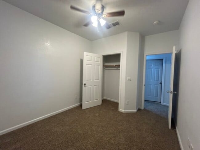 Building Photo - Secure gated community new carpet and paint