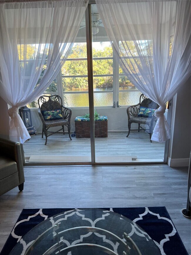 Building Photo - 9070 Lime Bay Blvd