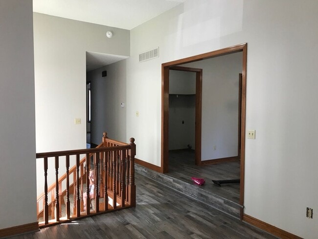 Building Photo - {1601} Spacious Duplex + Two Car Garage + Finished Basement + Fort Osage School District