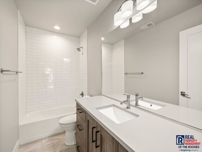 Building Photo - Spacious 3-Bedroom Townhome with Finished ...