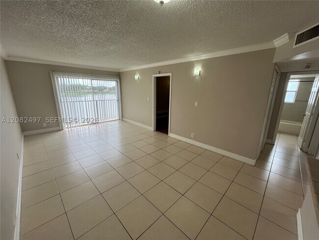 Building Photo - 8560 N Sherman Cir