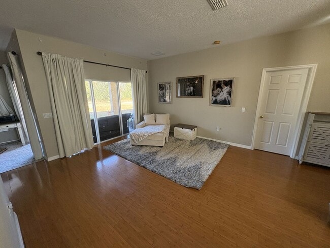 Building Photo - Florida Living Starts Here — Gated, Single-Story, Move-In Ready May 1!