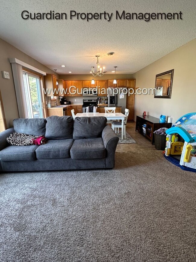 Building Photo - Lakeville End Unit Town Home, 2 Car Garage, 2.5 Baths, Walk out Patio, Available July
