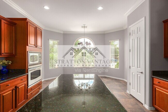 Building Photo - 7150 W Heritage Way