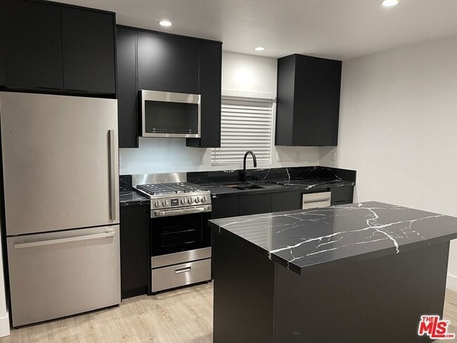 Building Photo - 9504 Gothic Ave