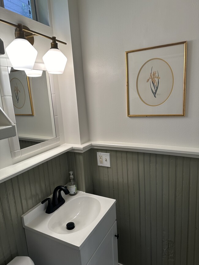 Bathroom with tiled walk in shower - 1314 Pleasant St