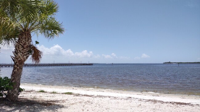 Building Photo - "Elegant 3-Bed Waterfront pool Home"