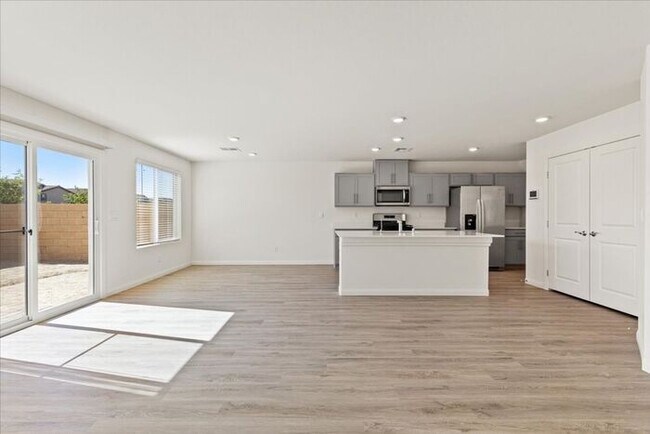 Building Photo - Modern 4-Bedroom Home with Turf Backyard in Gated Community