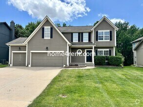 Building Photo - Beautiful Four-Bedroom Home with Three Car...
