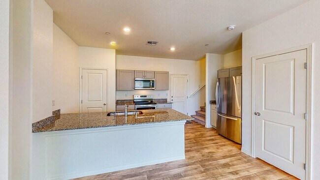 Building Photo - Cozy 2-story, 3BR 2BA townhome in a new community in North Las Vegas.