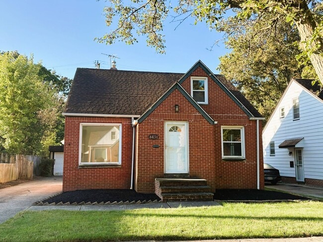 Primary Photo - 4-Bedroom Home with Finished Basement & Mo...