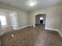 Building Photo - Two bedroom home with partially fenced yard!