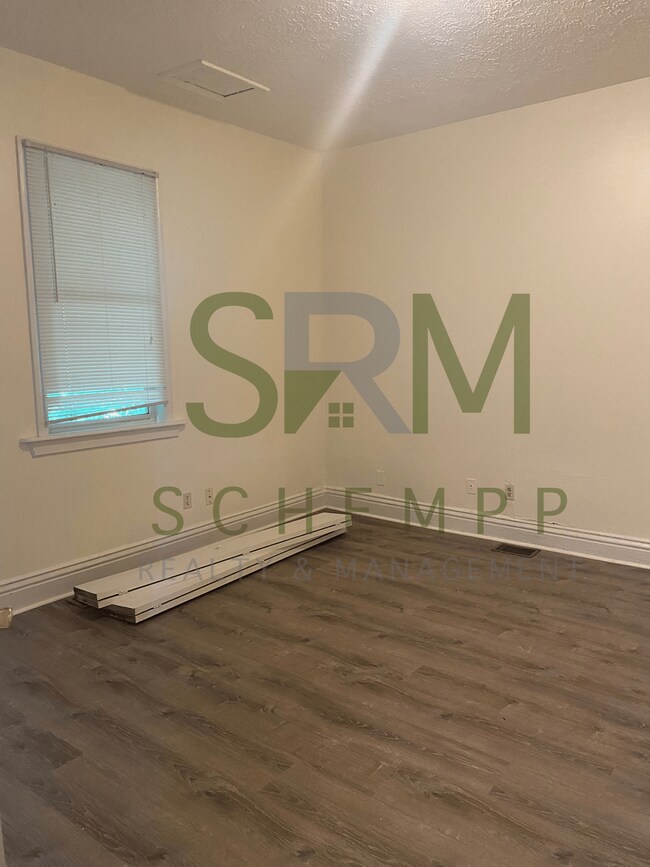 Building Photo - Updated three bedroom two bathroom home in West Louisville! *Section 8 accepted*