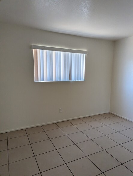 Building Photo - 1477 E 27th Ave