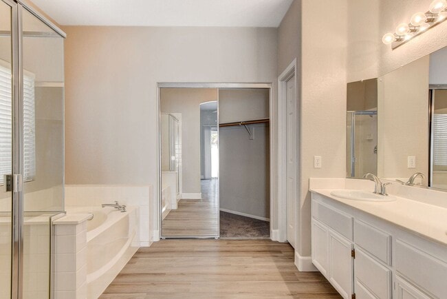 Building Photo - 1 Story in Summerlin - Fresh Carpet, Paint, and Luxury Plank!