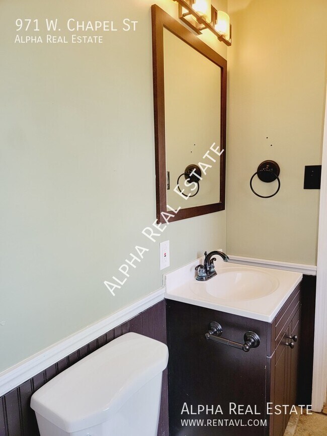 Building Photo - Pet friendly home with level fenced back y...