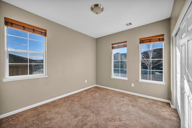 Building Photo - Sun-Filled, Spacious Living with a Three-Car Garage