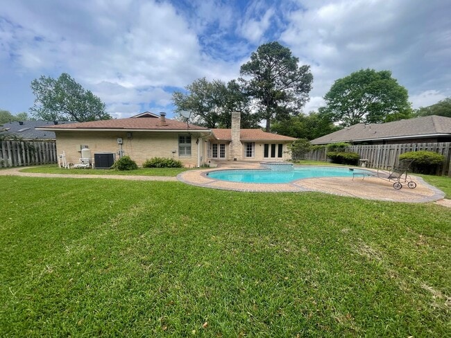 Building Photo - Summer fun with in-ground pool!
