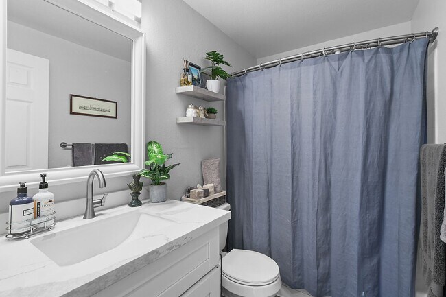 Building Photo - Remodeled River-View Corner Unit with Oversized Patio