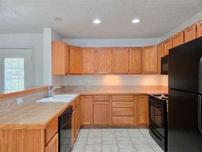 Building Photo - 8309 Burrell Dr