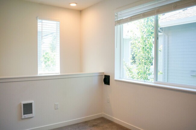 Building Photo - Modern & Sleek One-Bedroom Townhouse Ready...