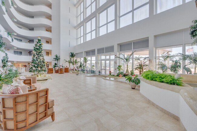 Building Photo - Direct Oceanfront Furnished Condo with Bre...