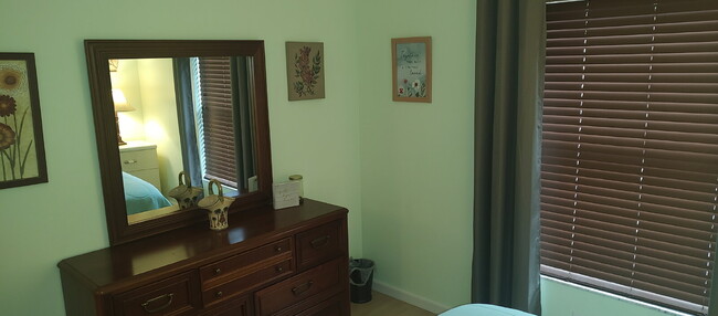 Building Photo - "Charming 2-Bed, 2-Bath Condo in Largo wit...