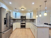 Building Photo - Beautifully Remastered Duet Home, Completely Renovated, A/C, Breakfast Bar, SS Appliances, W/D, W...