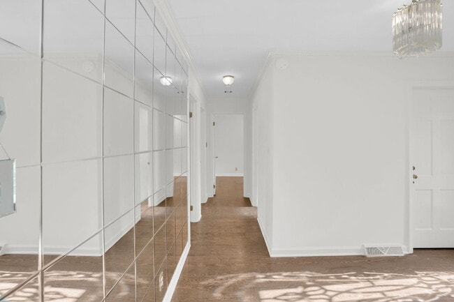 Building Photo - NOT YOUR AVERAGE 4 BEDROOM HOUSE!