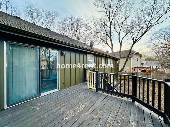 Building Photo - A Lovely Four Bedroom Home in Lenexa w/ Wood Floors, Finished Basement and a Fenced Yard!