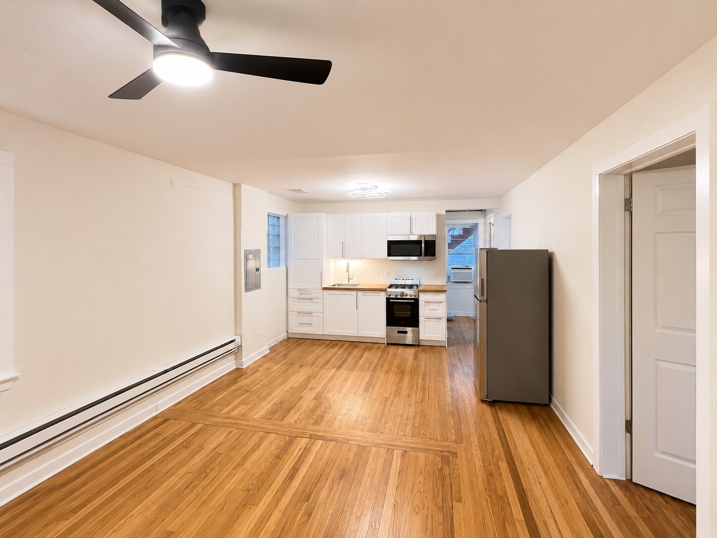 view of kitchen from living area - 2446 W Thomas St