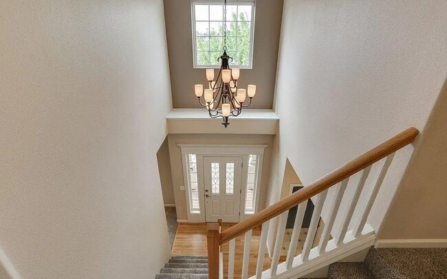 Building Photo - Spacious Four-Bedroom Home with Gourmet Kitchen, Multiple Living Areas, Loft, and Beautifully Lan...