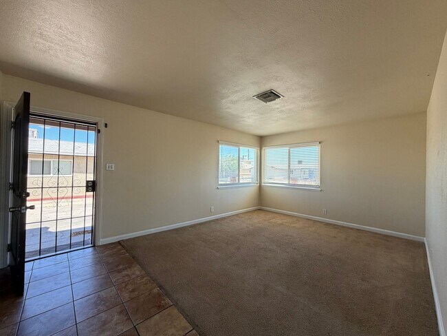 Building Photo - 3 Bedroom 2 Bathroom House with Central A/C , 2 Car Garage and Beautiful Backyard with Covered Patio