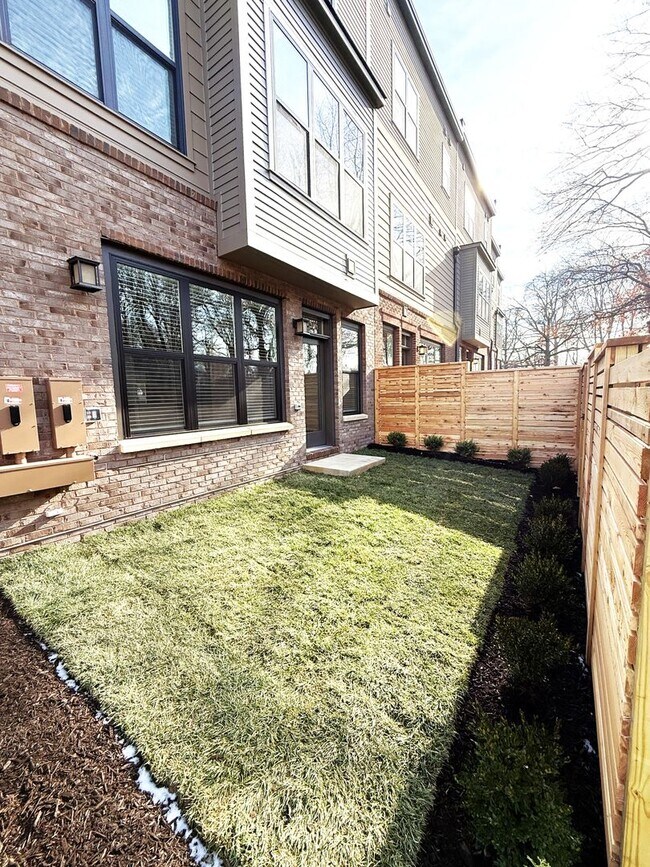 Building Photo - Brand new 4 level, 4 Bedroom Townhome with Elevator!