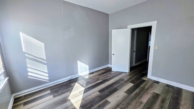 Building Photo - Beautiful Two Bedroom, Plus a Pass Through Room with a Fenced in Rear Patio