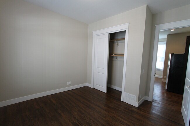 Building Photo - Midtown Renovated Duplex - Hardwood Floors, Exposed Brick
