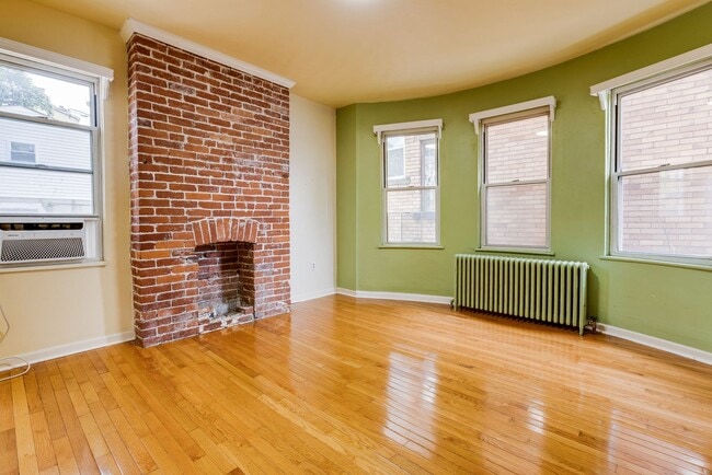 Building Photo - AVAILABLE June 2026 - Beautiful 4 Bedroom, 2 Bath Home w/ Front Porch Swing!