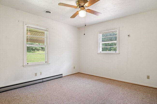 Building Photo - Charming 3 Bedroom Home with Tranquil Sett...