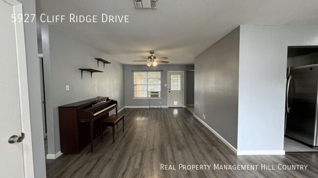 Building Photo - Three bedroom home with covered patio