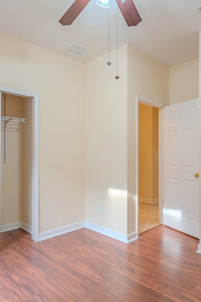 Building Photo - Spacious 5BR Home in Falcon Trace | 3-Car Garage | Screened Patio | Resort-Style Amenities Rent: ...