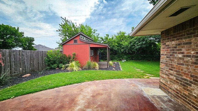 Building Photo - Inviting Home with Bonus Workshop Space!