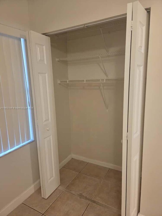 Building Photo - 7406 Woodmont Terrace