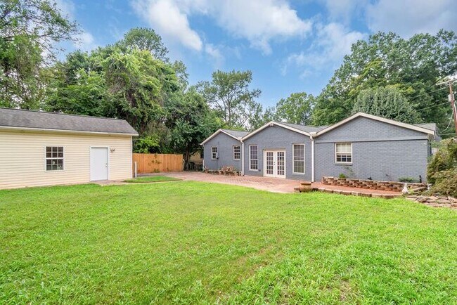 Building Photo - Space to Live, Room to Dream, 4BR/2BA with flex space, office, 2 car dettached garage and ample p...